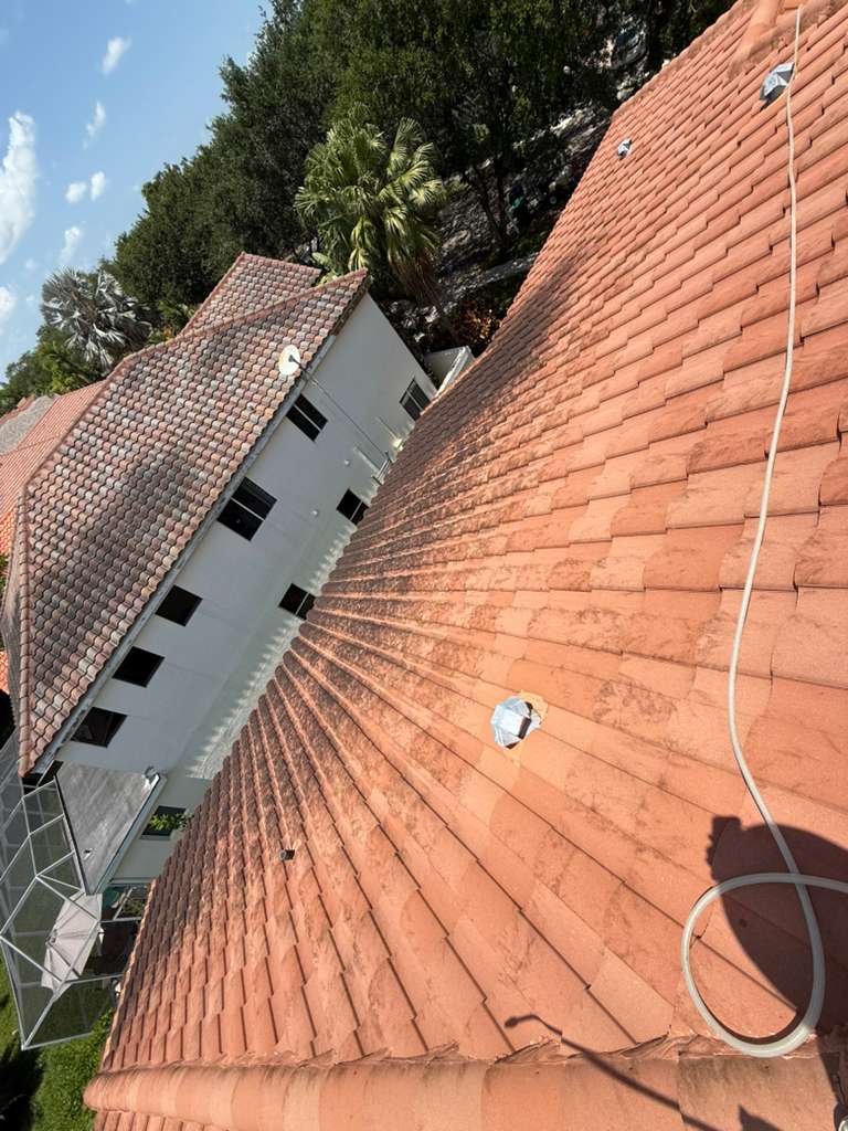 Patio Pressure Washing - Before professional lawn care and landscaping service by The Fresh Feel in South Florida